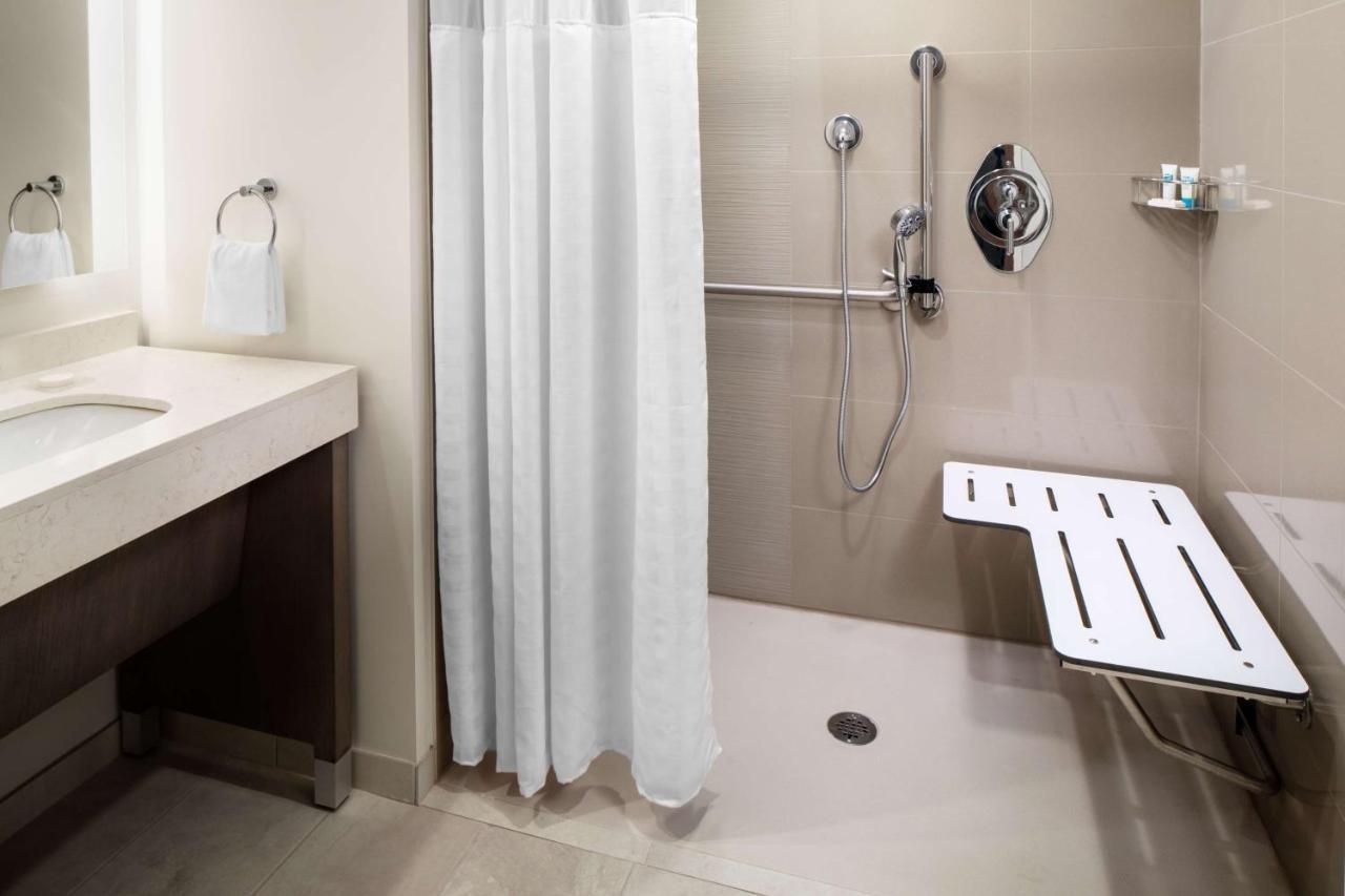 One-Bedroom Suite Two Queen Beds Sofa Bed Kitchen Roll Shower Disability Access