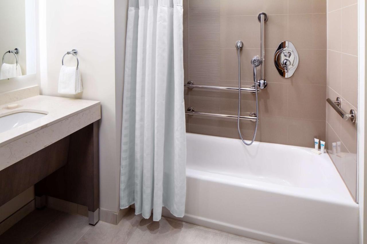 One-Bedroom Suite Two Queen Beds Sofa Bed Kitchen Tub Disability Access
