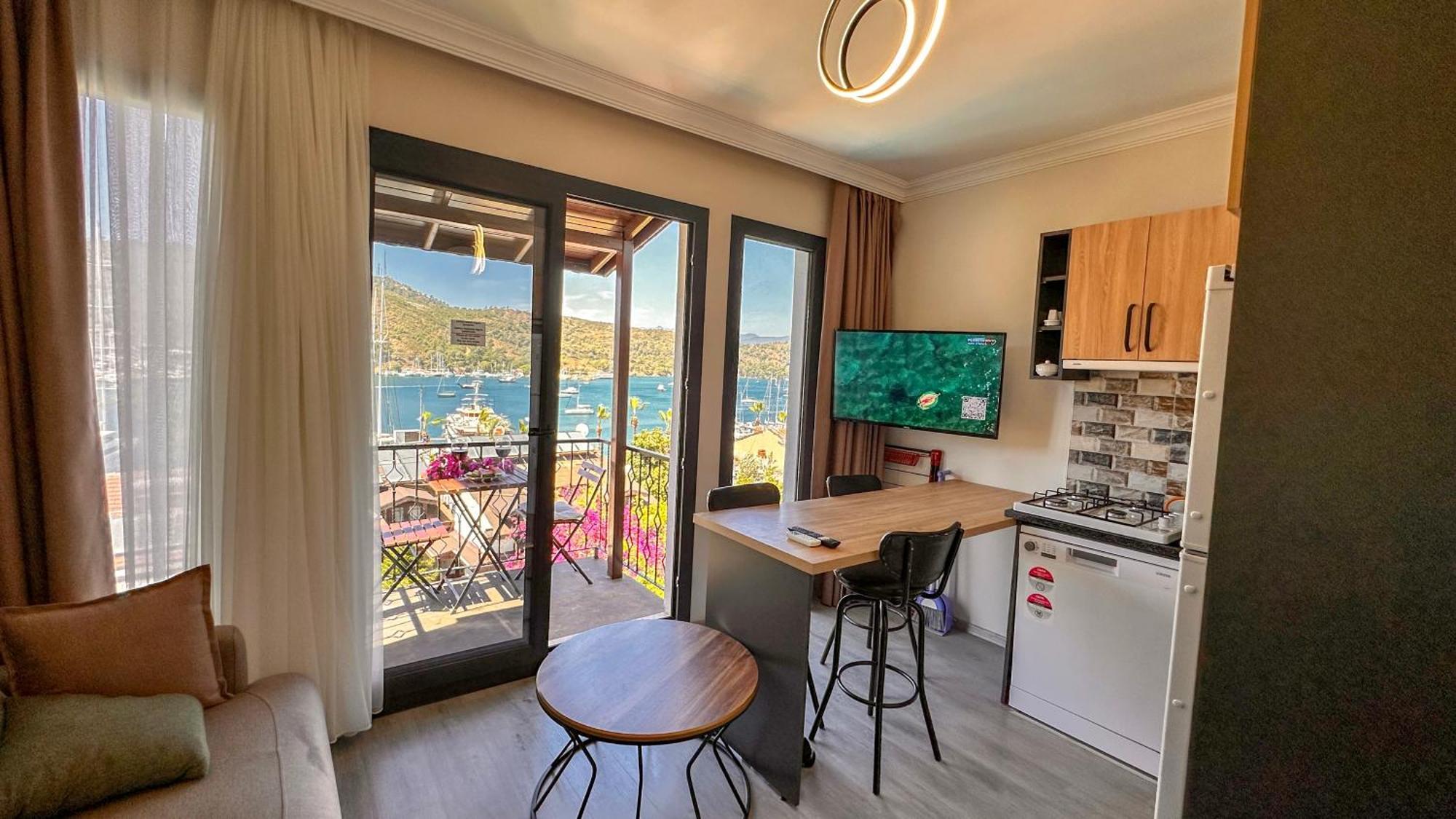 Apartament typu Suite z łóżkiem typu queen-size i widokiem na morze
