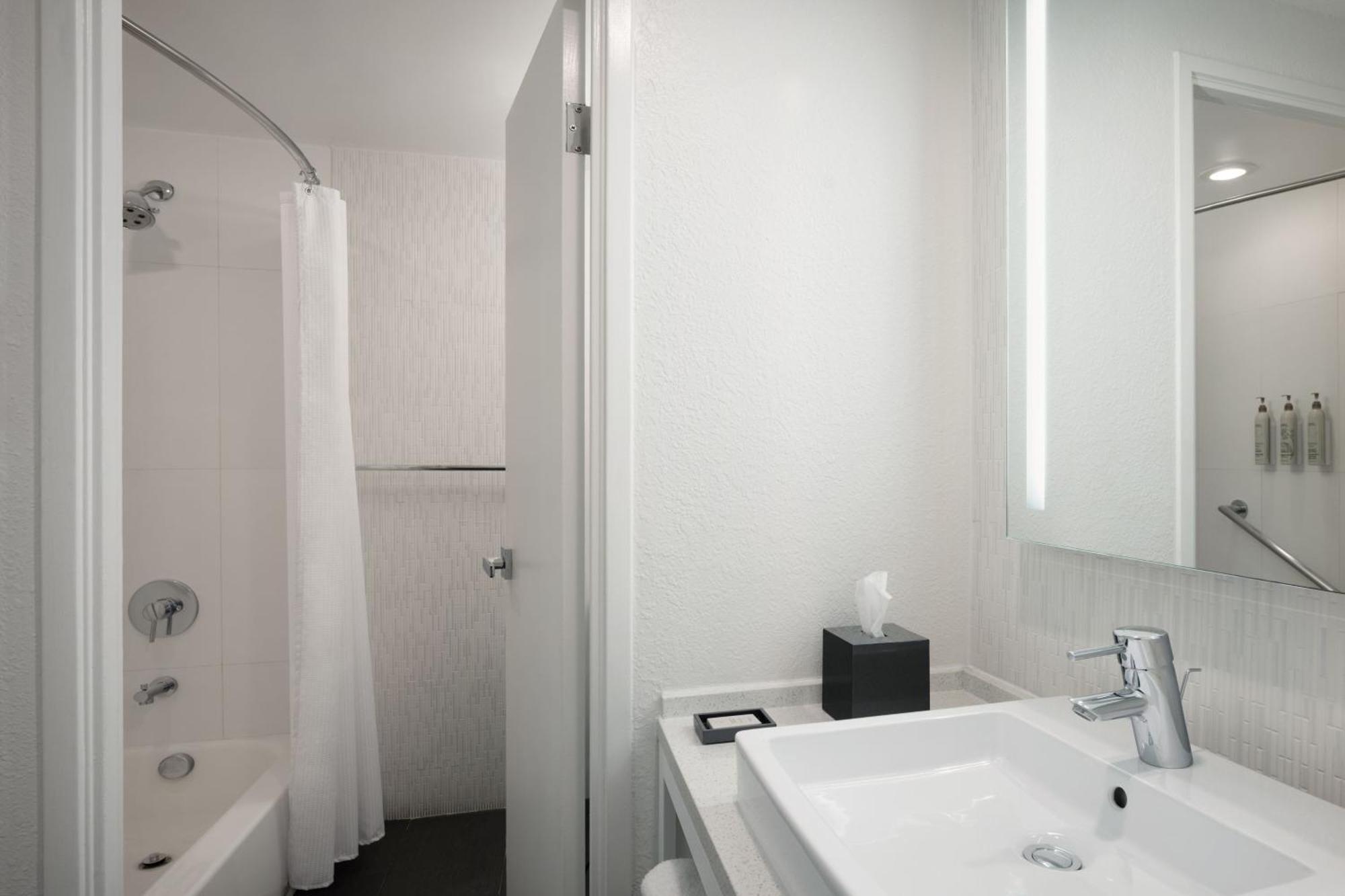 King Room Pool View Balcony Mobility Accessible Tub