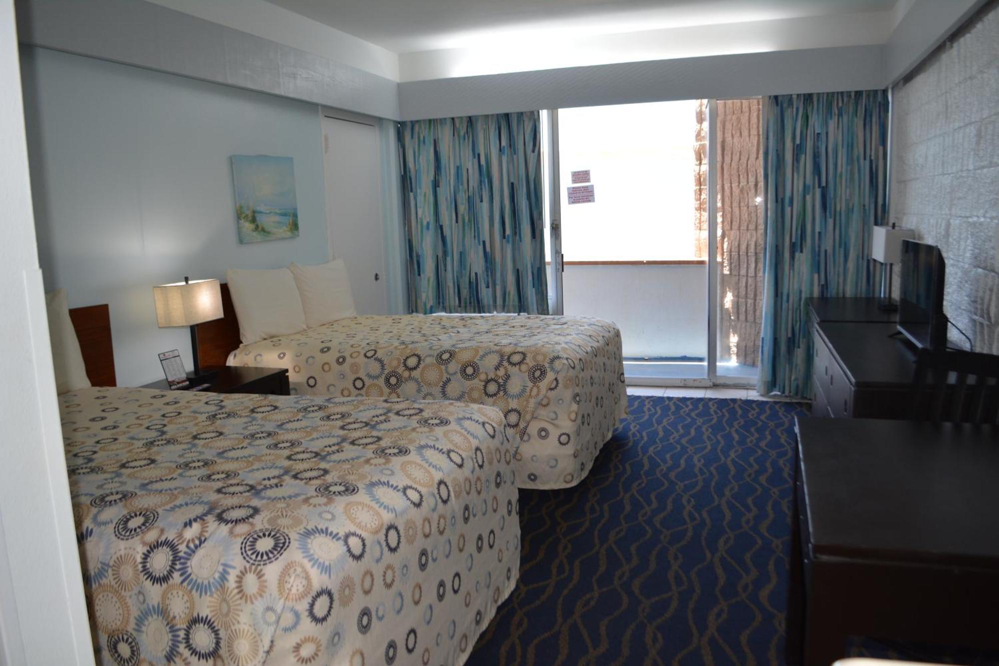 Standard Room Two Double Beds South Partial Ocean View