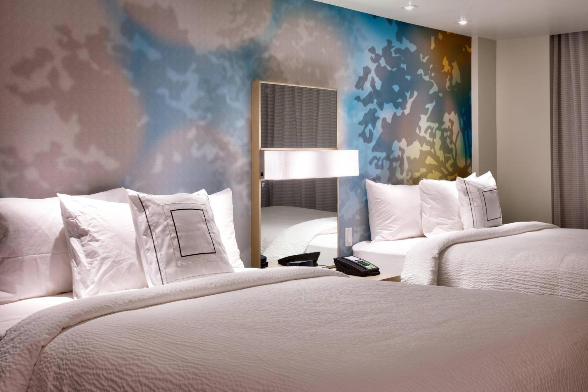Queen Room Two Queen Beds Roll Shower Mobility Access or Hearing Accessible