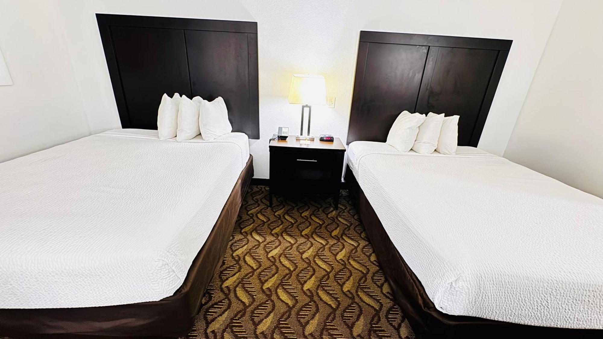 Room One King Two Queen Beds Non-Smoking