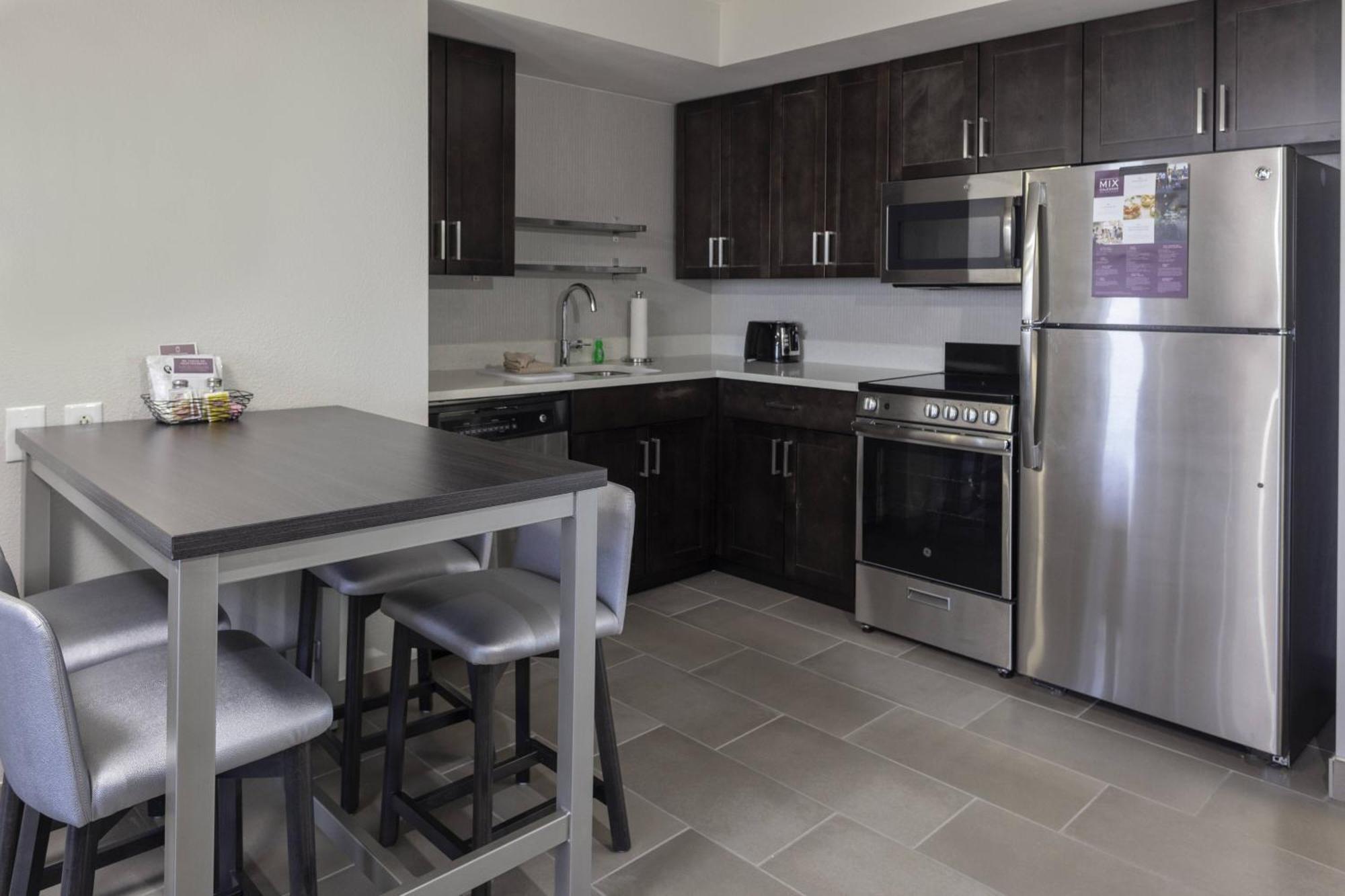 One-Bedroom Oceanfront Residential King Suite Sofa Bed Mobility Accessible Roll Shower