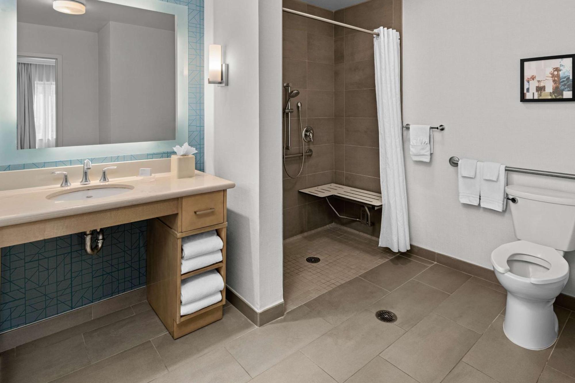 King Studio Roll Shower Mobility Hearing Access