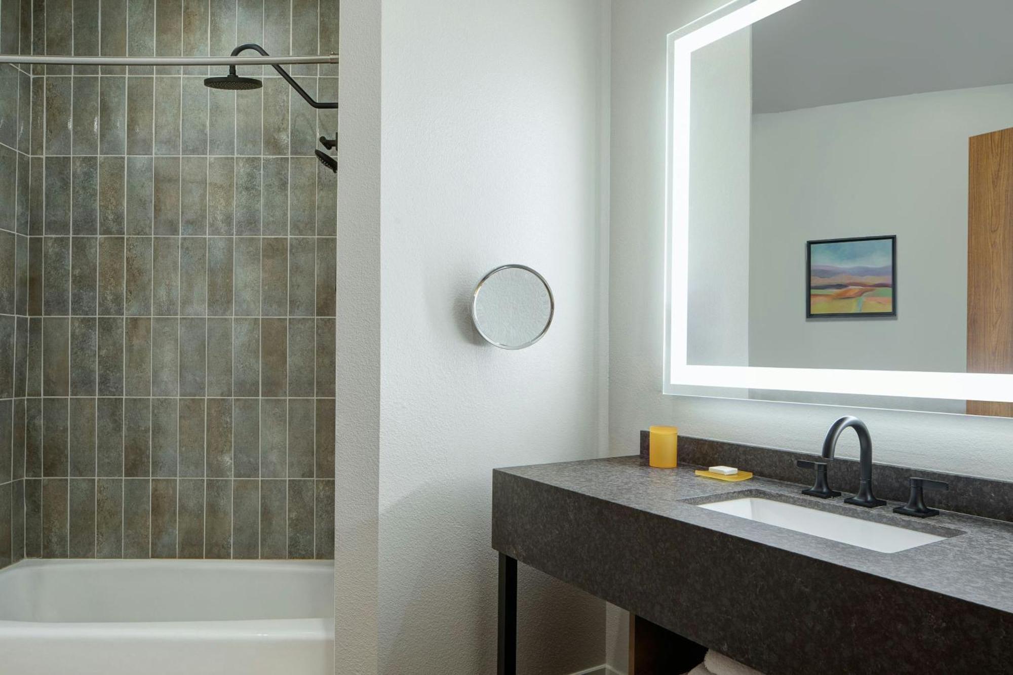 Standard Queen Room Mobility or Hearing Accessible Roll Shower
