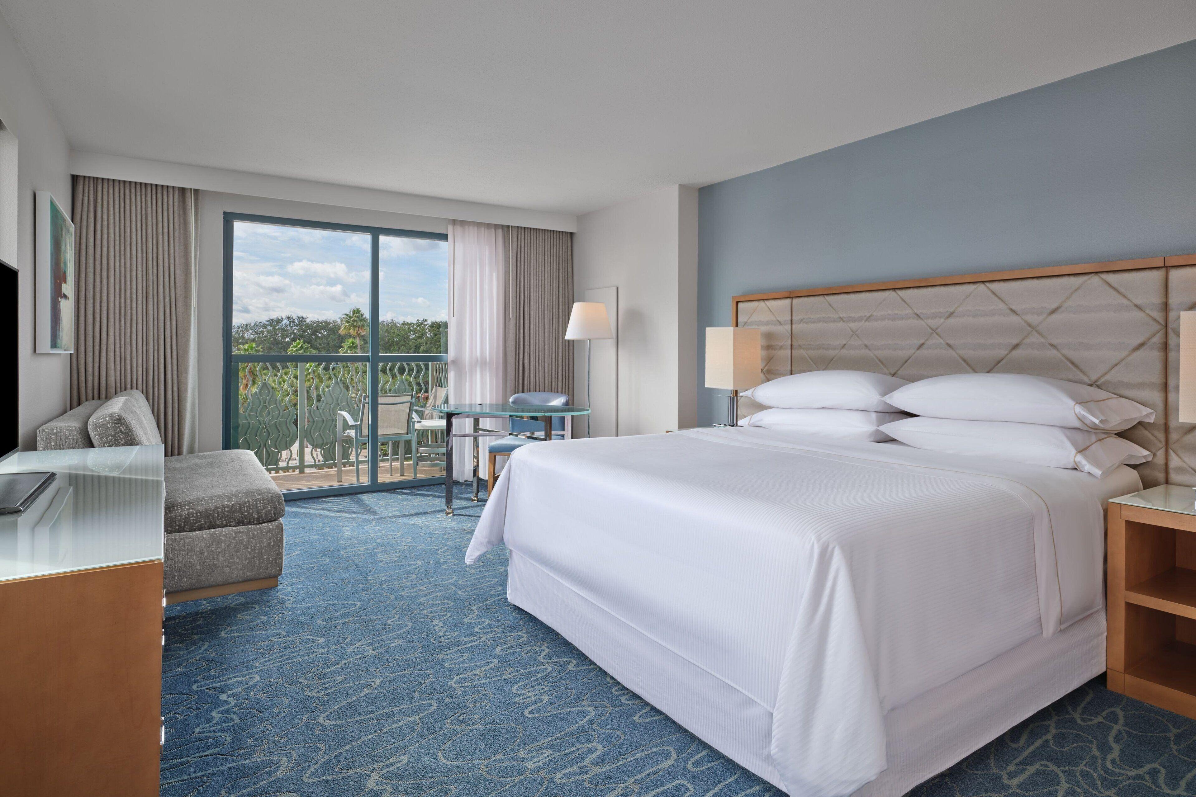 Balcony King Guest room 1 King Resort view Balcony Includes Early Entry To Disney Theme Parks