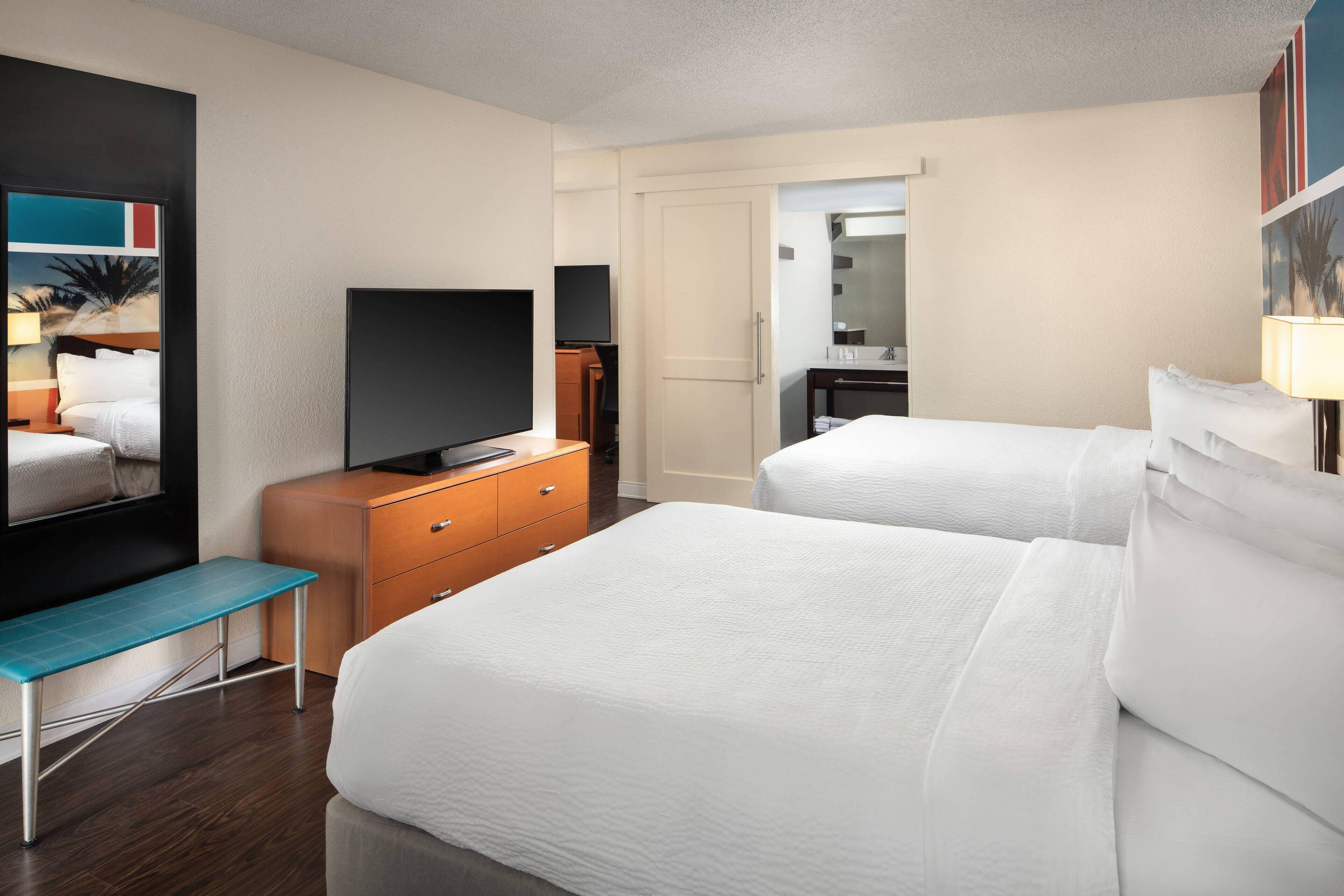 Junior Suite Two Queen Beds Sofa Bed
