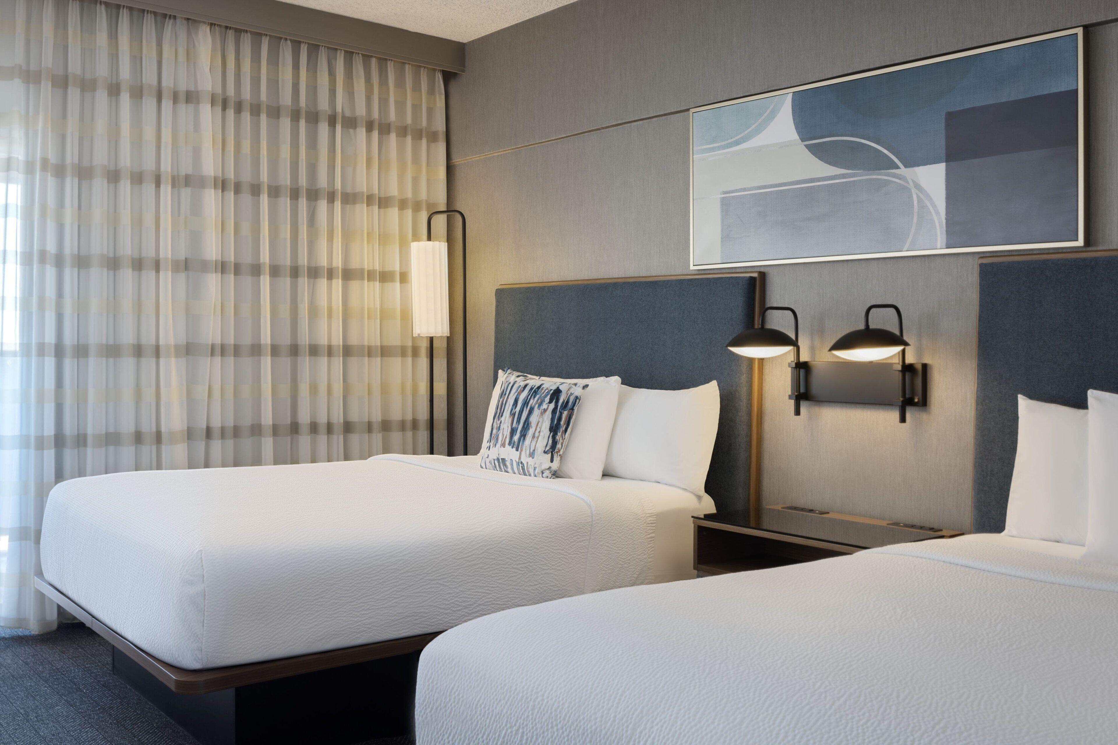 One-Bedroom Queen Suite Two Queen Beds Bathtub Sofa Bed Mobility Access or Hearing Accessible