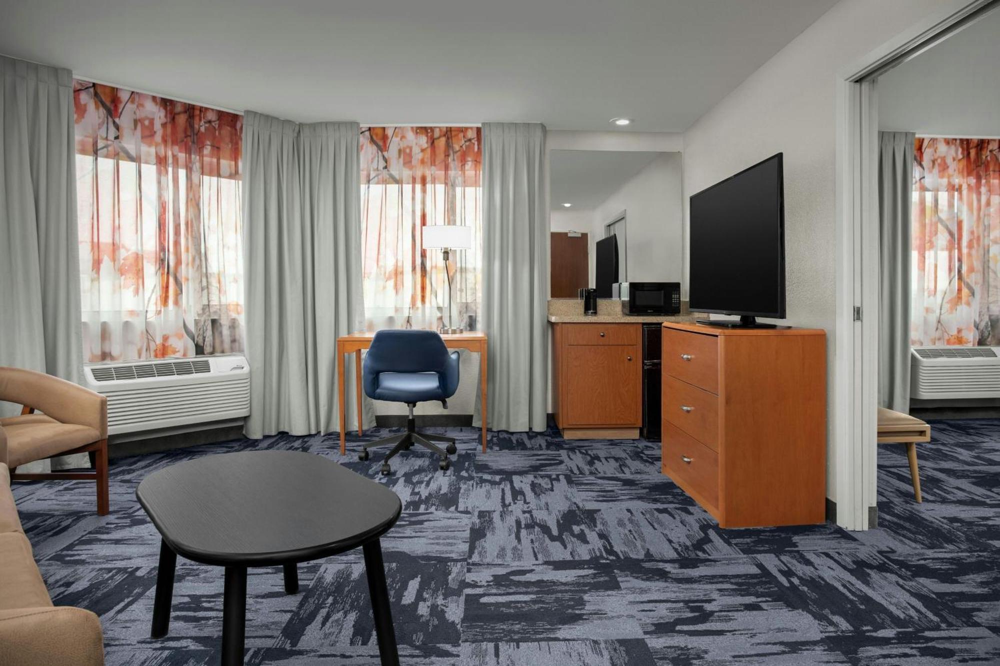 One-Bedroom King Suite Roll Shower Sofa Bed Mobility Access or Hearing Accessible