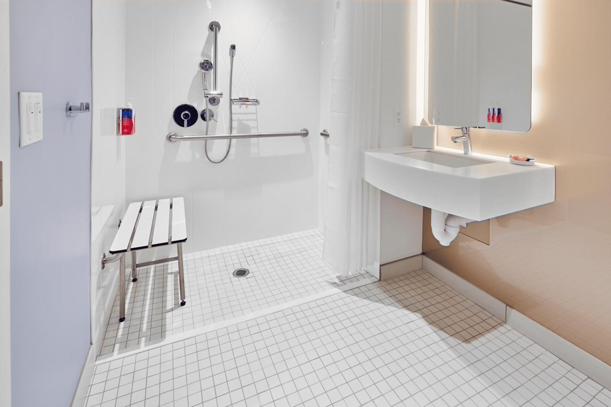 Mobility Accessible Standard Room w or roll shower Includes Early Park Admission*