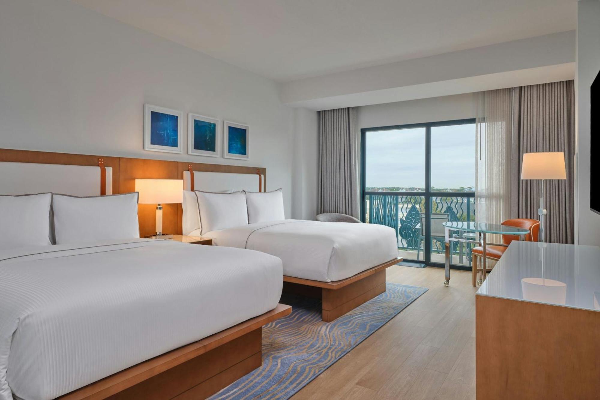 Resort View Queen Balcony Guest room 2 Queen Resort view Includes Early Entry To Disney Theme Parks