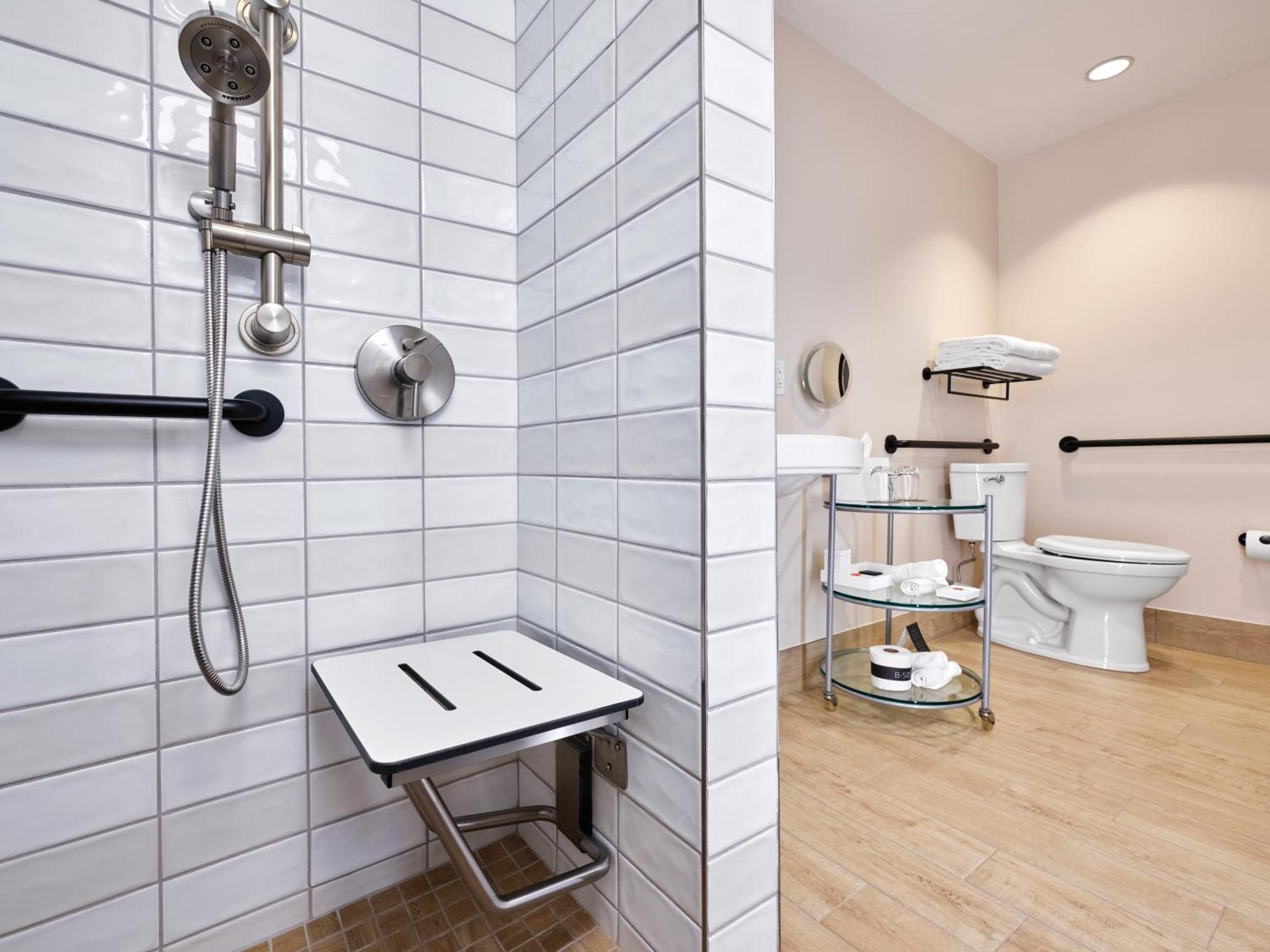 Mobility Accessible Garden View 2 Queen Room w or roll shower Includes ^ Universal Express Unlimited