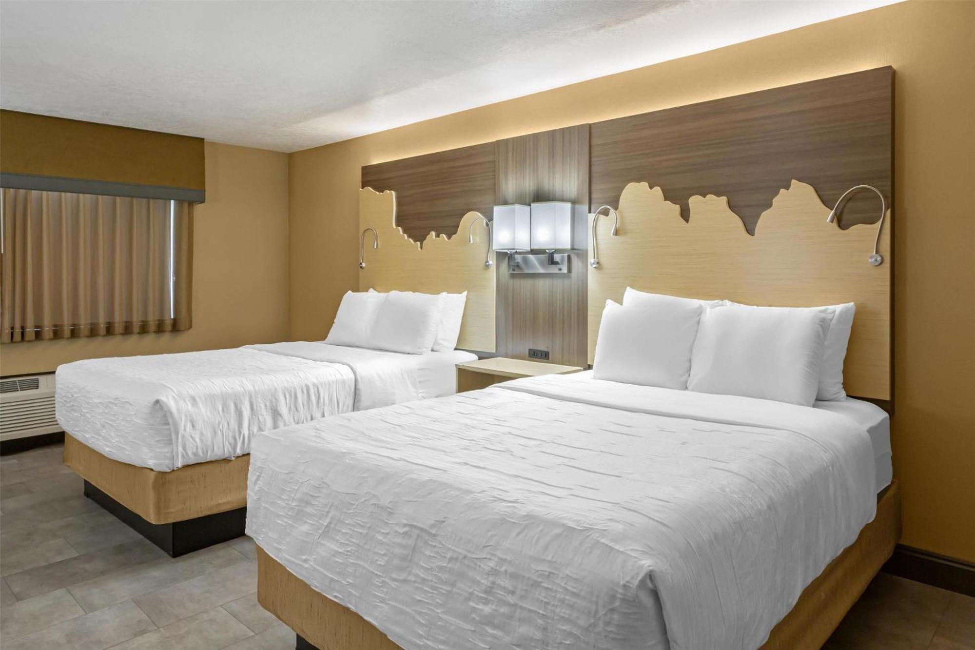 Queen Room Two Queen Beds Roll Shower Disability Access or Non-Smoking