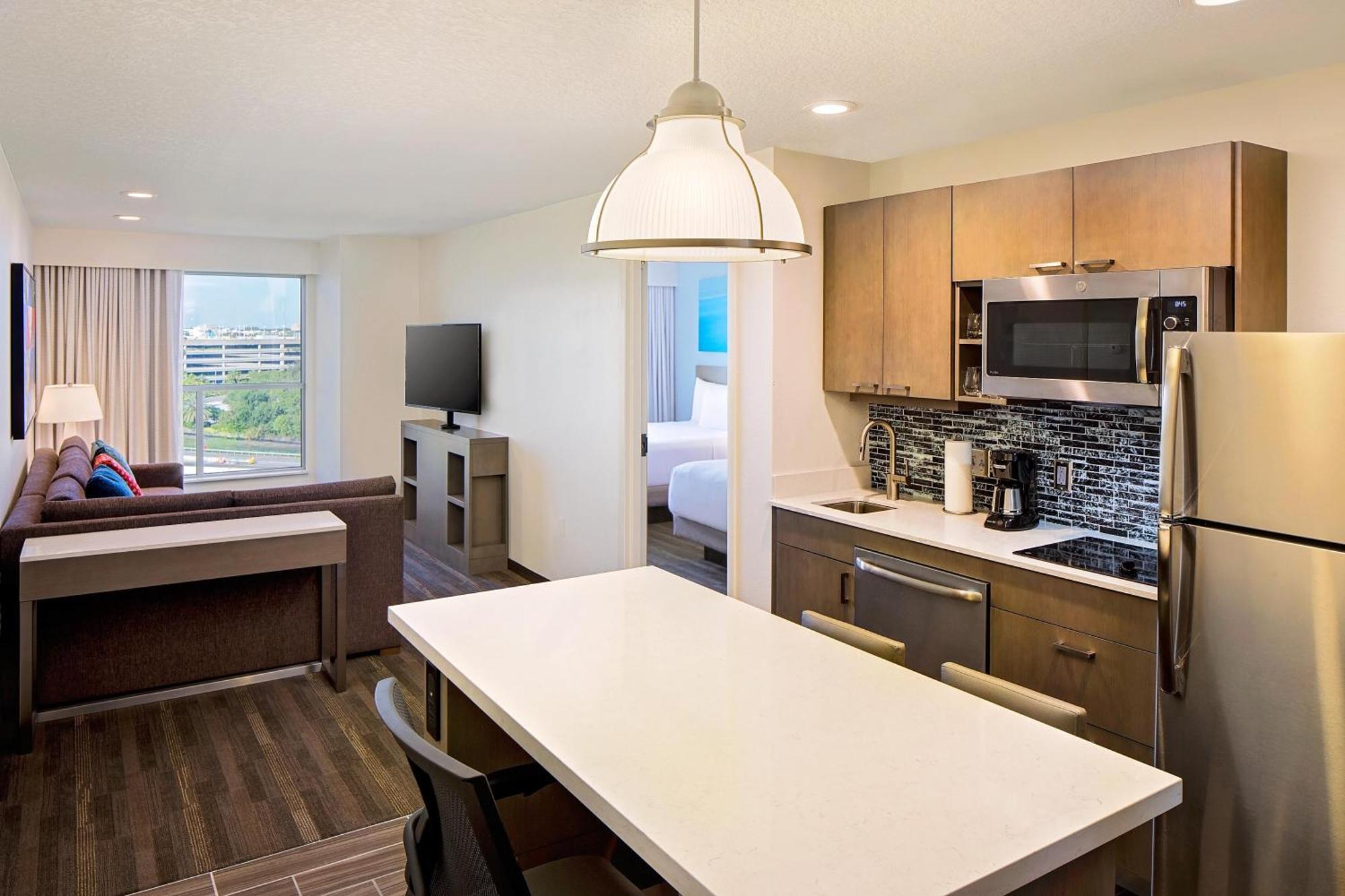 One-Bedroom Specialty Suite Two Queen Beds Kitchen Sofa Bed