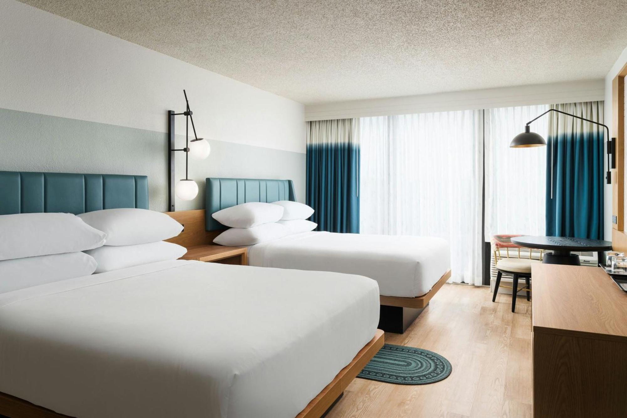 One-Bedroom Suite Two Double Beds Sofa Bed Pool View