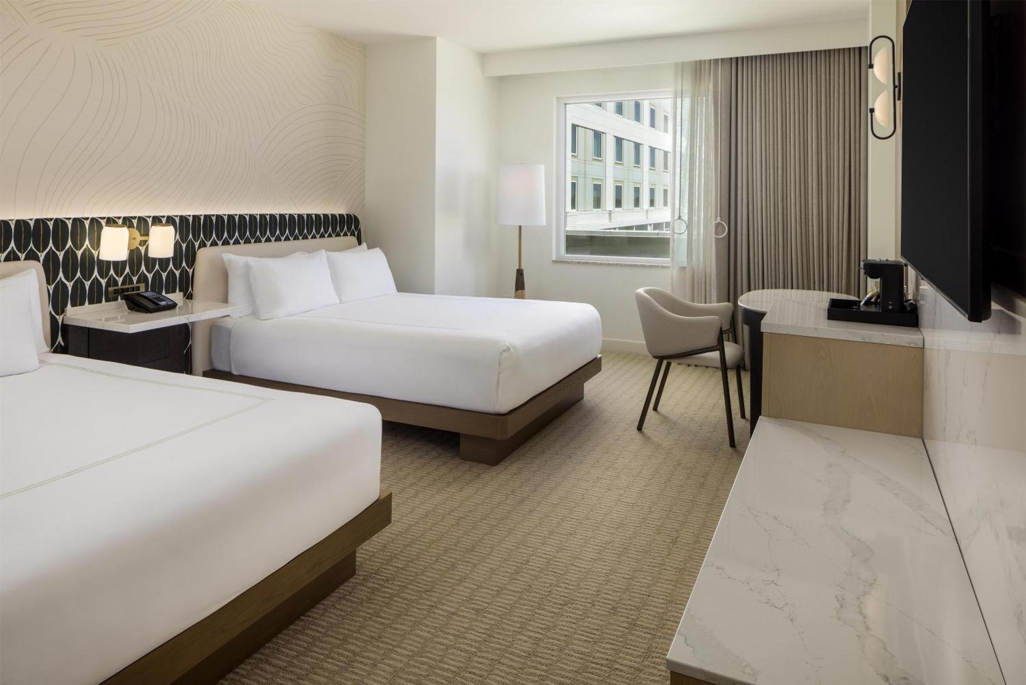 Queen Room Two Queen Beds Pool View Mobility Access or Bathtub
