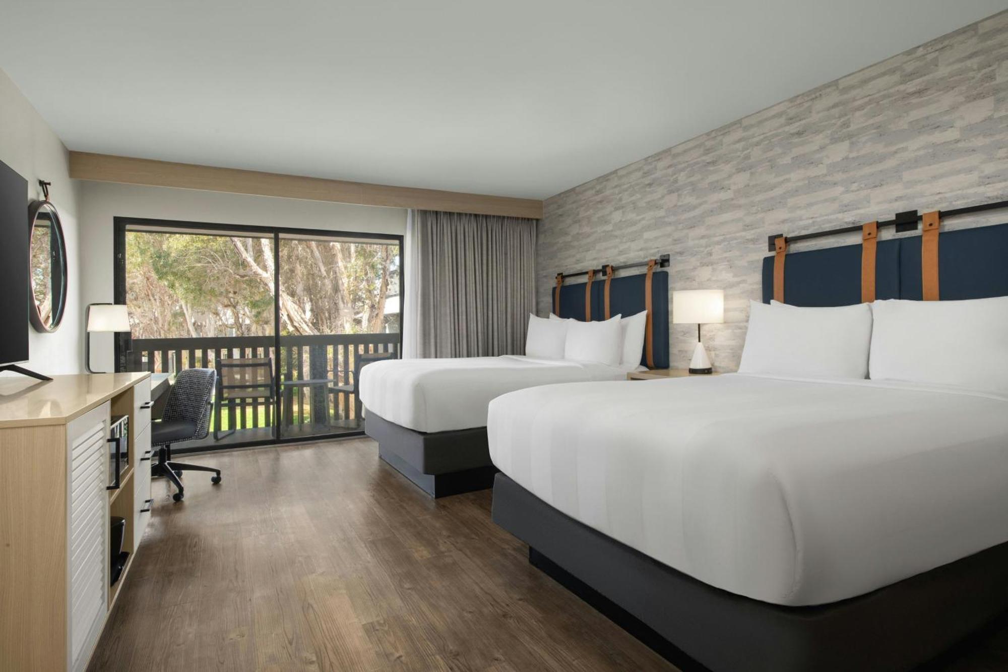 Queen Room Two Queen Beds Roll Shower Courtyard View or Mobility Accessible