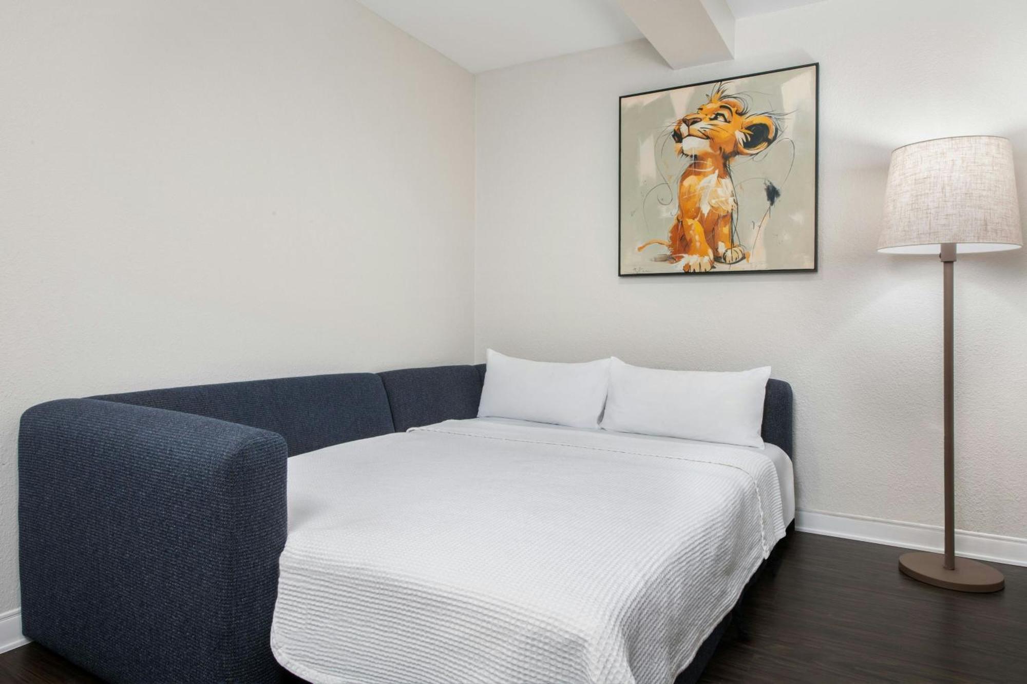 Junior Suite Two Queen Beds Sofa Bed