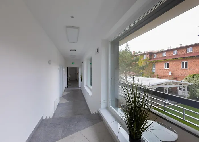 APARTAMENTY przy plaży z basenem z podgrzewaną wodą i mini SPA - Ośrodek Kolonijno-Wczasowy Mewa Niechorze